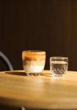 Coffee served in a La Rochere Troquet tumbler on a table