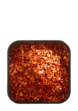 open tin showing aleppo chili flakes