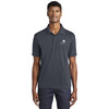 Model wearing Sport-Tek® PosiCharge® RacerMesh® Polo with Watkins Wellness embroidered logo on a white background.