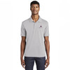 Model wearing Sport-Tek® PosiCharge® RacerMesh® Polo with Watkins Wellness embroidered logo on a white background.