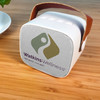 TerraTone™ Wireless Speaker with Watkins Wellness Logo on a table.