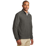 Model is wearing Interlock 1/4 Zip Sweater in Charcoal color front view