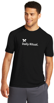 Model is wearing Daily Ritual Raglan Tee Shirt in black color