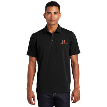 Model is wearing OGIO Limit Polo Caldera in black color