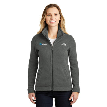 Model is wearing The North Face Ladies Sweater Fleece Jacket in black color