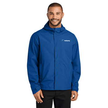 Man wearing True Royal color Port Authority® C-FREE® Rain Jacket with white background