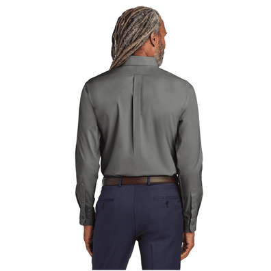 Model is wearing Brooks Brothers® Wrinkle-Free Stretch Pinpoint Shirt in Newport Blue color back side view