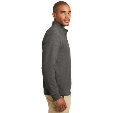 Model is wearing Interlock 1/4 Zip Sweater in Charcoal color side pose
