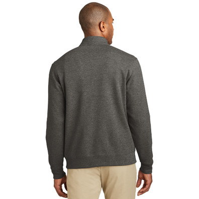 Model is wearing Interlock 1/4 Zip Sweater in Charcoal color back view