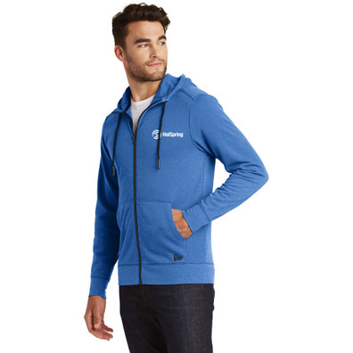 Model is wearing New Era Tri-Blend Fleece Heathered Hoodie in Royal color side view