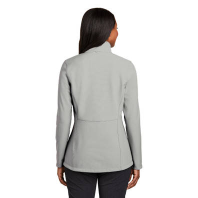 model is wearing Collective Soft Shell Jacket in gray color back view