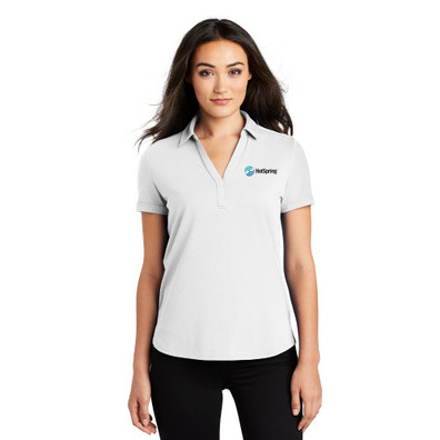 OGIO Ladies Limit Polo  in white on model. 