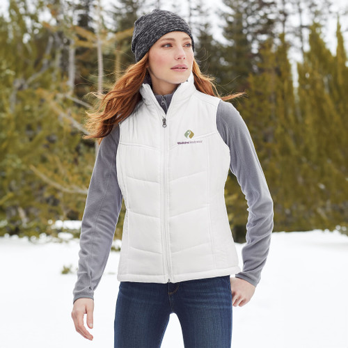 Model is wearing Port Authority® Ladies Puffy Vest. Model is wearing Port Authority® Ladies Puffy Vest.