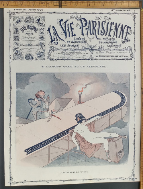 Cupid flying a biplane with a naked woman on the back. If love had had an airplane by J. Kuhn Regnier. Old Original Antique French color print from 1909.