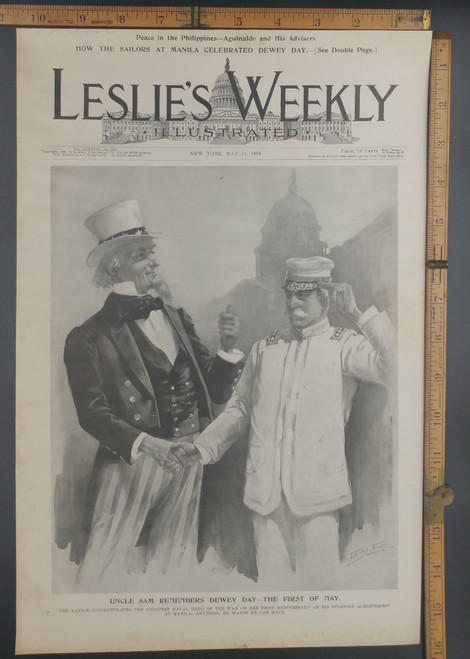 Admiral Dewey. Uncle Sam remembers do E day the 1st of May. The nation celebrates the greatest naval hero of the war. Original Antique print from 1899.