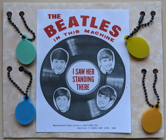 Beatles - 1960s Set Of 4 The Beatles In This Machine I Saw Her Standing There Gumball Charms/Keychains