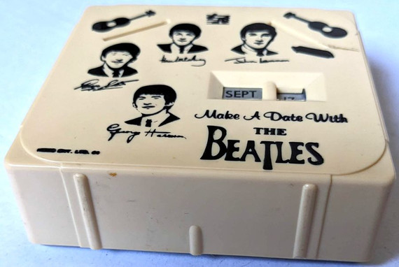 Beatles - Vintage Make A Date With The Beatles Calendar/Coin Bank
