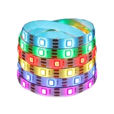 Laser multi colour LED strip light coiled and illuminated against a white background