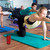 Laser Splashproof Bluetooth Speaker Red next to a Yoga Mat