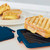 Laser Heatwave Tech Microwave Toastie Maker Blue with a Grilled sandwich