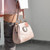 Laser Coral Pink Smart Tag in Lifestyle Setting