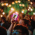 lifestyle image of mirror rgb power bank used outdoors showing magnetic charging on phone