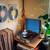 Laser turntable on side table surrounded by records