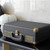 Laser closed turntable suitcase on table