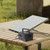 NRGVault 150W Portable Power Station connected to a portable solar panel for off-grid outdoor charging