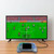 Person using the Laser retro handheld game console connected to a TV in a living room