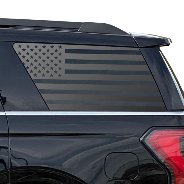 Matte black American flag decal on SUV side window