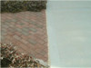 Clean and seal expansion joint between paver walkway and concrete driveway