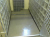 Kennel Poly Step Guard Clear with Antiskid over an existing coated floor.