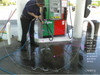 SealGreen Oil Cleaner Degreaser is frist applied to pump and then rinse with hose or pressure washer