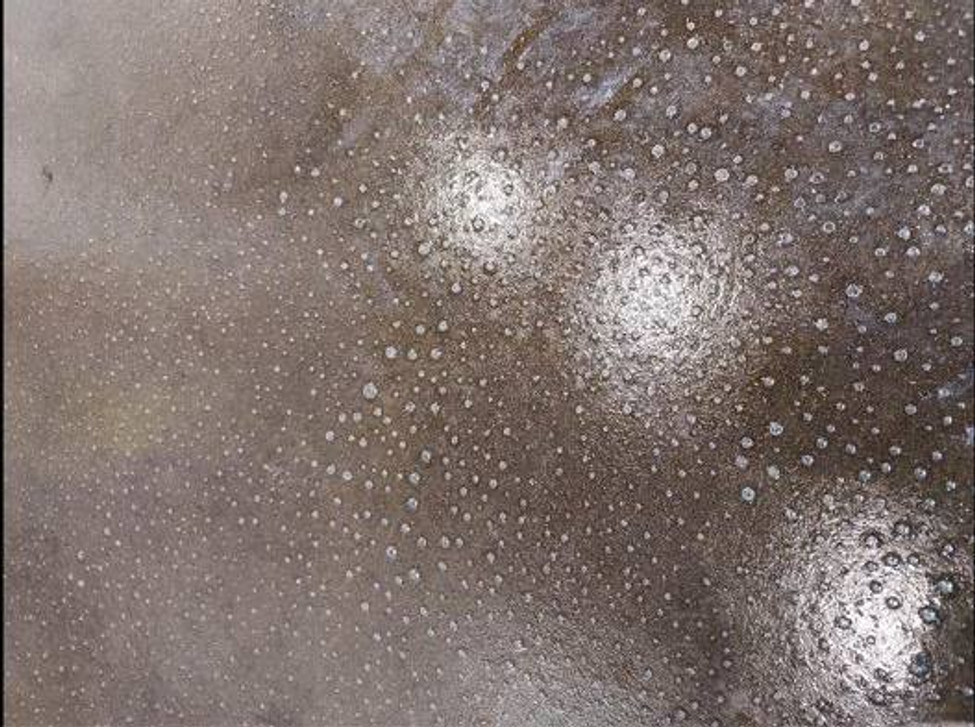 I try restoring the shine on my floor and I got bubbles all over