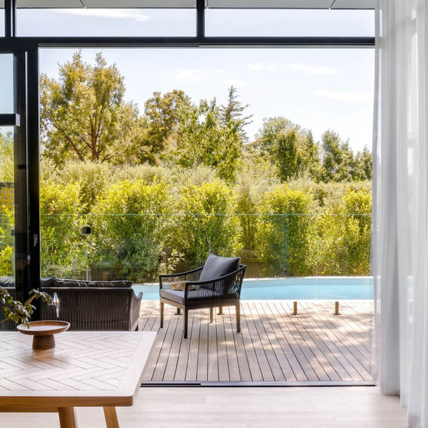 Taylor Herringbone Dining Table zoomed in display outdoor view