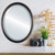 Lifestyle 1 - Pasadena Framed Oval Mirror - Rubbed Bronze