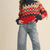 Mock Neck Fair Isle Fringe Sleeve Sweater