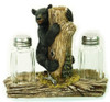 Salt and pepper shaker with Black Bear holding them Table top items