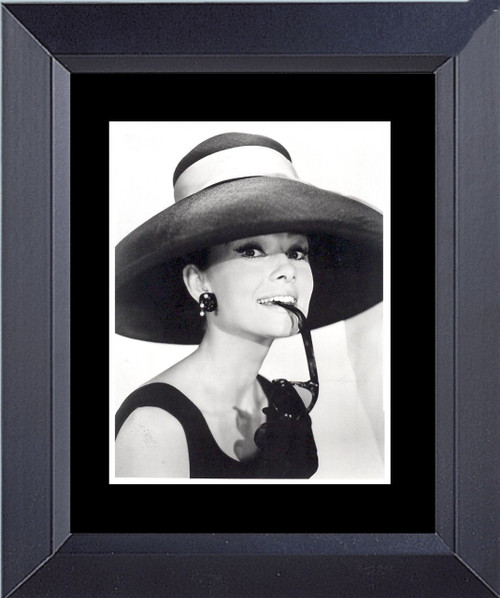 Audrey Hepburn Breakfast At Big Hat Framed Print