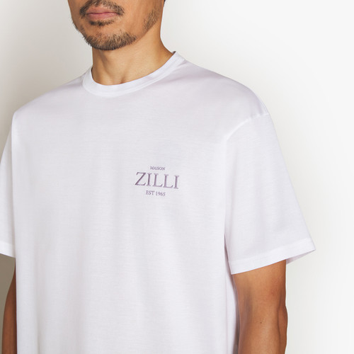 White T-shirt, round neck, “Fantasy” patch on back White T-shirt, round neck, “Fantasy” patch on back