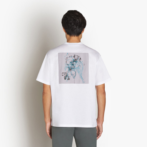 White T-shirt, round neck, “Fantasy” patch on back White T-shirt, round neck, “Fantasy” patch on back