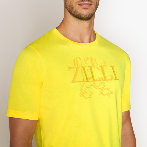 Canary yellow plain round neck T-shirt with “Lion Griffon” embroidery Canary yellow plain round neck T-shirt with “Lion Griffon” embroidery
