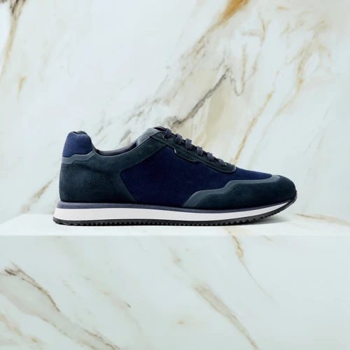 “Hidden Stitched” sneakers in periwinkle blue