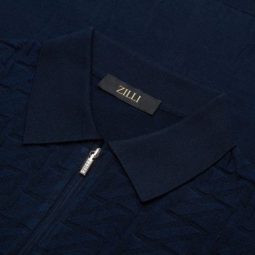 Polo zippé bleu marine, tissage jacquard "Zig Zag" Polo zippé bleu marine, tissage jacquard "Zig Zag"
