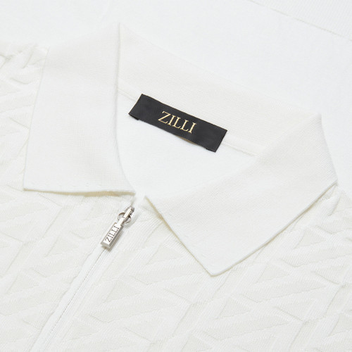 White zipped polo shirt, "Zig Zag" jacquard weave White zipped polo shirt, "Zig Zag" jacquard weave