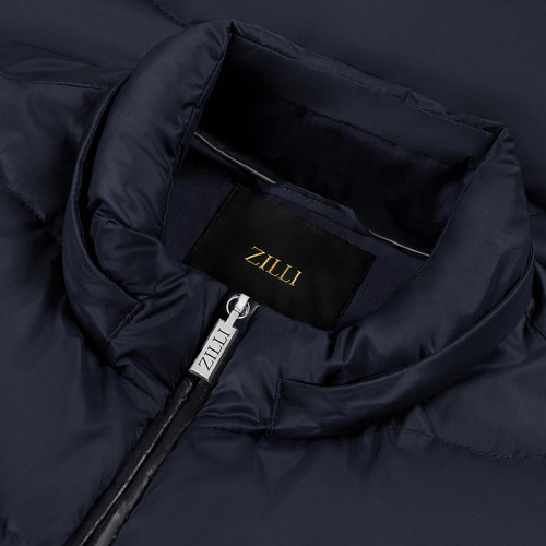 Navy-blue sleeveless padded coat, removable hood