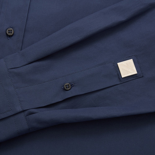 Blue "casual" shirt, metallic signature on the sleeve,  topstitched collar