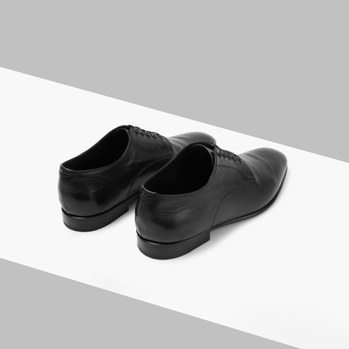 Black lambskin derbies with crocodile details 