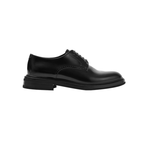 Black derbies, stitching details